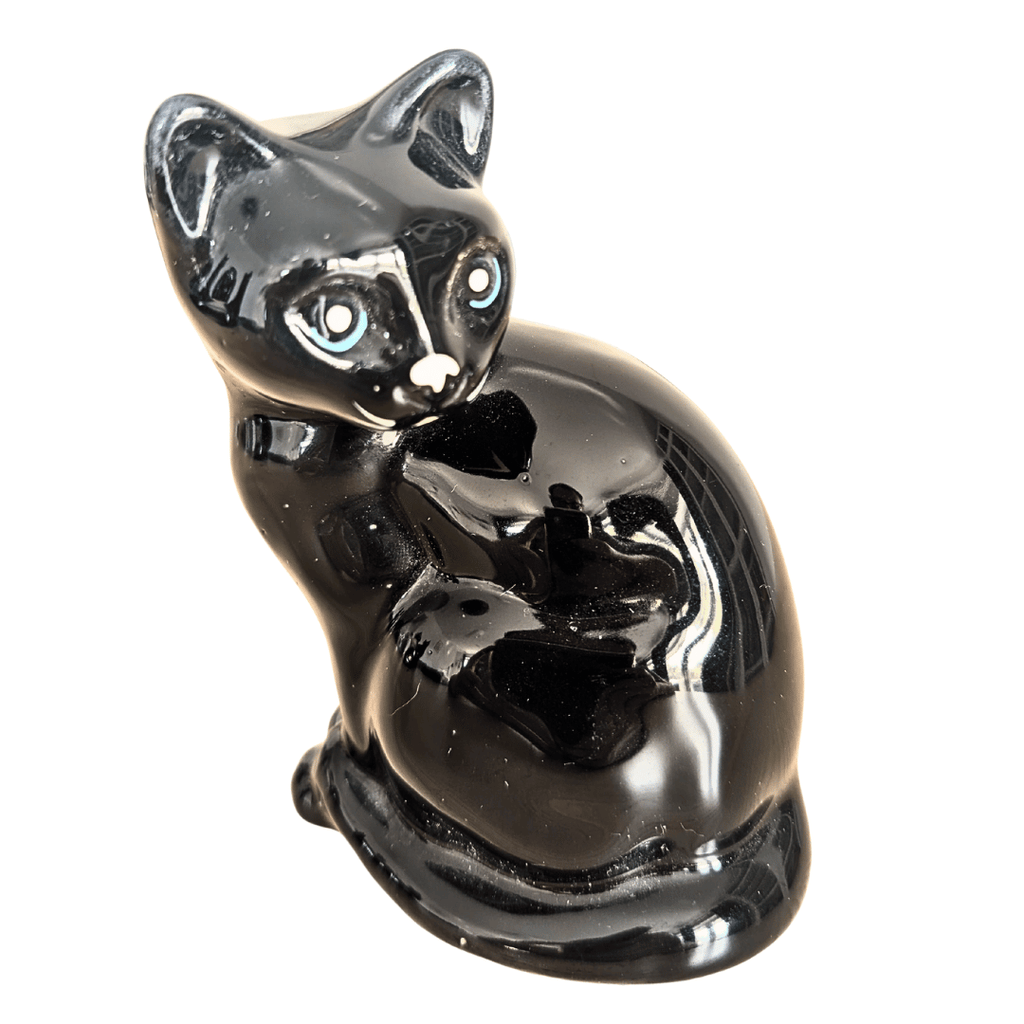 Schwarze Katzenfigur aus glänzend schwarzer Keramik