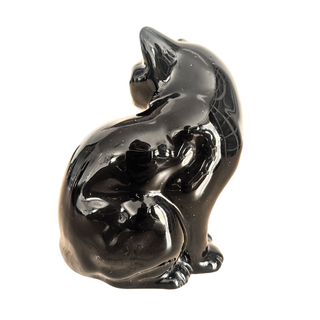Schwarze Katzenfigur aus glänzend schwarzer Keramik