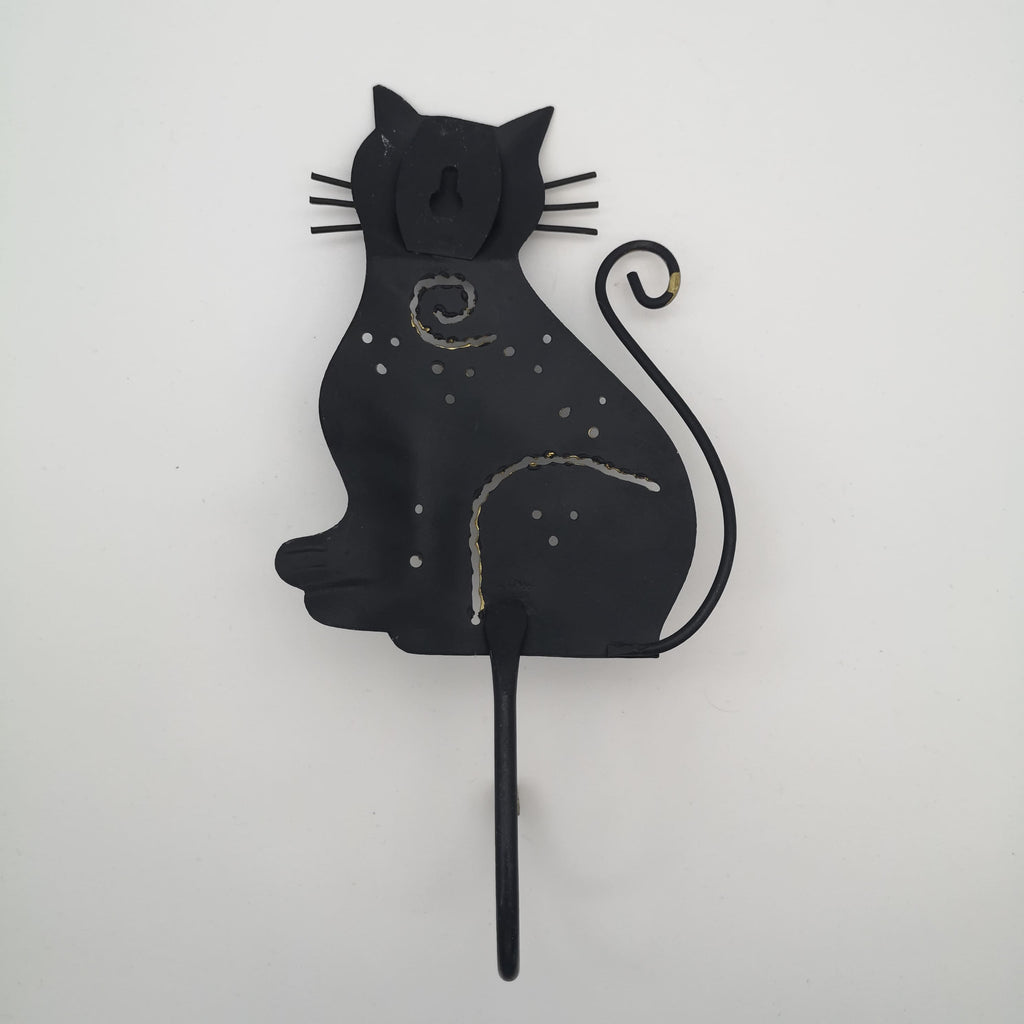 Wandhaken mit einer schwarzen Katze